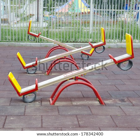 Three teeter totters. Shot on a playground