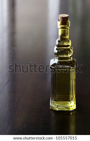 Vintage glass bottle on wooden table