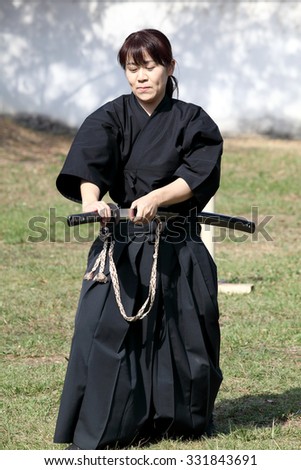 KAGAWA, JAPAN - OCTOBER 25: Katana sword fighters at Marugame Iai Festival, event dedicated to Japanese culture and tradition at Marugame-castle on October 25, 2015 in Japan.