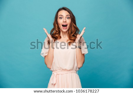 Similar – Image, Stock Photo Cheerful young lady standing near wall with colorful graffiti on street