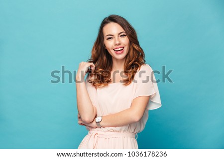 Similar – Image, Stock Photo Cheerful young lady standing near wall with colorful graffiti on street