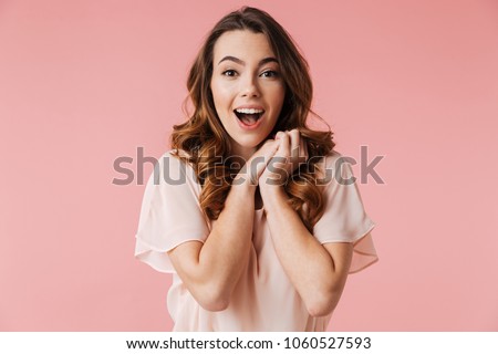 Similar – Image, Stock Photo Fun portrait of girl with her trendy white sweater over her head hiding, cold. Listening to music with headphones. Woman with tied hair. Photo in studio.