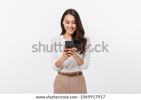 Similar – Image, Stock Photo Young businesswoman using smartphone and holding documents