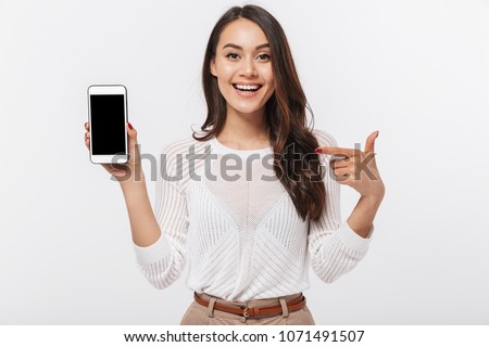 Similar – Image, Stock Photo Young Asian ladies showing V sign and smiling while lying on grass in sunlight