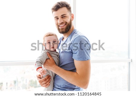 Similar – Image, Stock Photo Father with baby looking out window