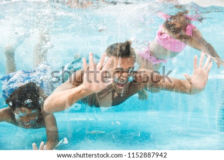 Similar – Image, Stock Photo Man swimming under water in sea