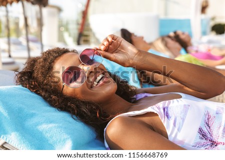 Similar – Image, Stock Photo Afro woman enjoying summertime and eating an ice-cream