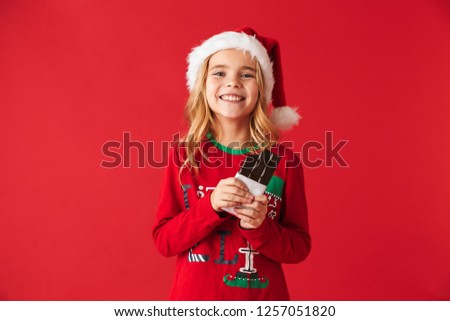 Image, Stock Photo Chocolate Santa Claus looks out of a white paper bag with starlight