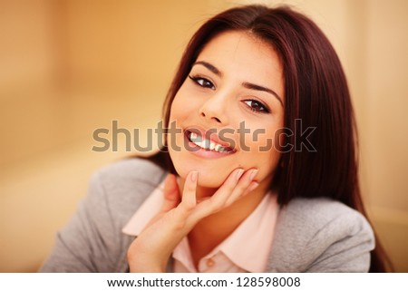 Closeup portrait of a Young confident smiling woman