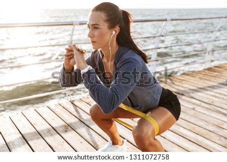 Similar – Image, Stock Photo Sportswoman doing exercise with dumbbells