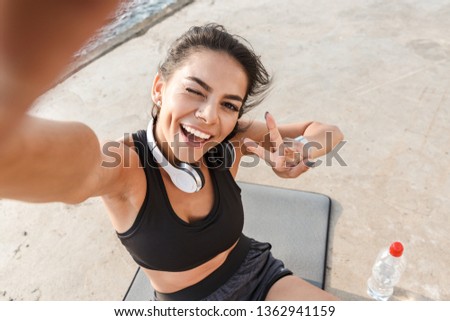 Similar – Image, Stock Photo Sportswoman on shore with paddle board