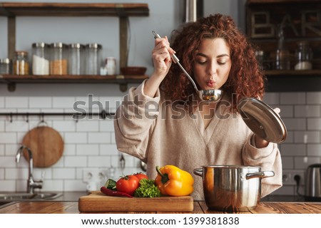Similar – Image, Stock Photo Preparation of soup in a pot, in nature.