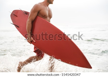 Similar – Image, Stock Photo Crop surfer on board in sea water