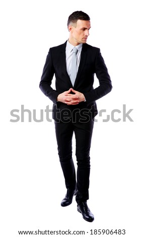 Full-length portrait of a thoughtful businessman isolated on a white background