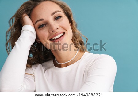 Similar – Image, Stock Photo young woman in blue sweater holding a Romanesco in front of her face