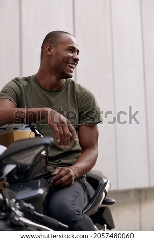 Similar – Image, Stock Photo Man sitting on motorcycle and surfing mobile