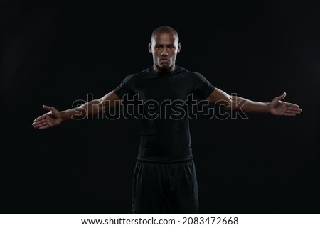 Similar – Image, Stock Photo Black serious sportive man using smartphone during workout