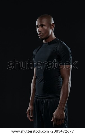 Similar – Image, Stock Photo Black serious sportive man using smartphone during workout