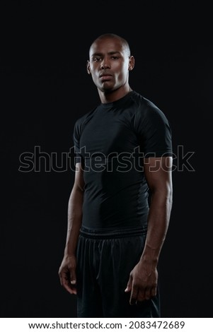 Similar – Image, Stock Photo Black serious sportive man using smartphone during workout