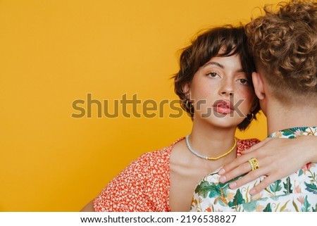 Similar – Image, Stock Photo Woman looking back holding man’s hand on beach