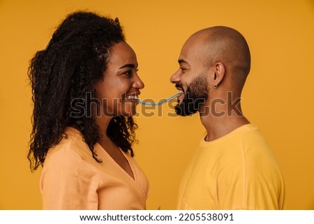 Similar – Image, Stock Photo Black woman eating candy