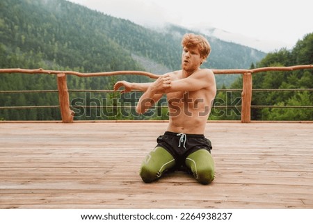 Similar – Image, Stock Photo Shirtless man doing yoga on terrace