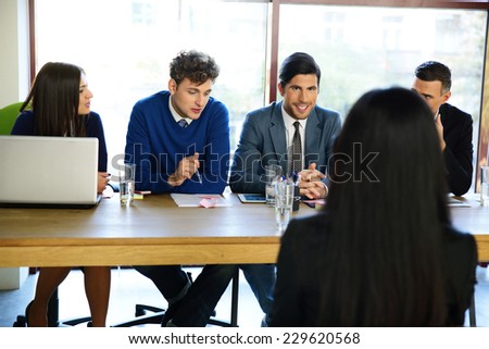 business, career and office concept - businesswoman at job interview in office