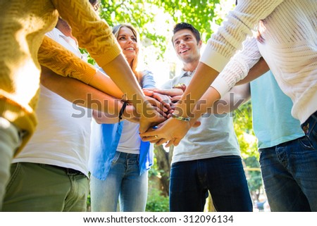 Group of a friends hands together