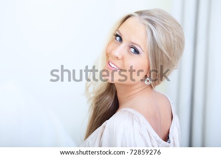 Portrait of a beautiful woman looking back