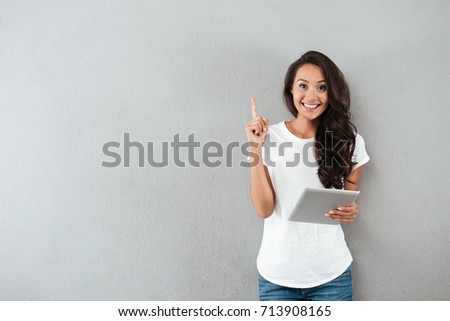 Similar – Image, Stock Photo Woman with joy pad sitting in dark room