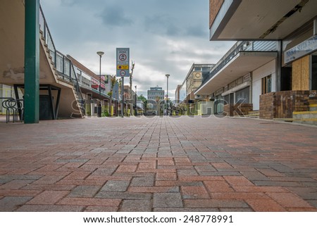 BRACKNELL, UK - AUGUST 11, 2013: An empty high street in the Berkshire town of Bracknell. Awaiting demolition to make way for re-development.