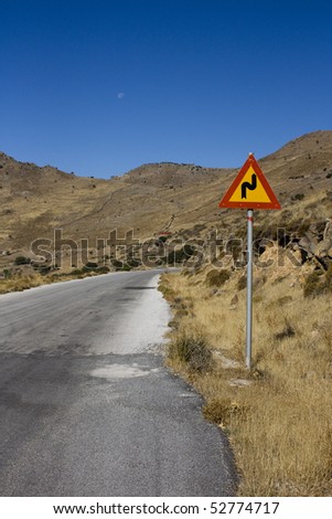 road sign on a deserted road
