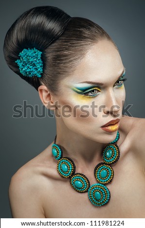 Beautiful woman with turquoise jewelry