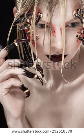 Woman with scary spikes on face