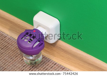 Anti-mosquito fumigator in wall outlet