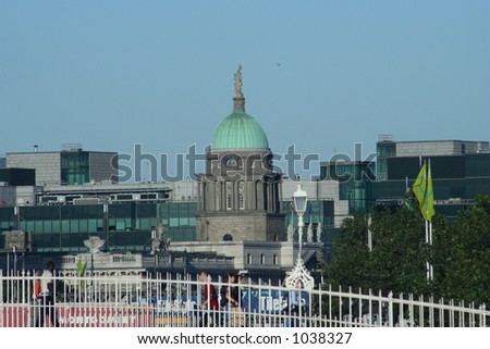 Ha\'Penny Bridge Dublin - Customs House in background