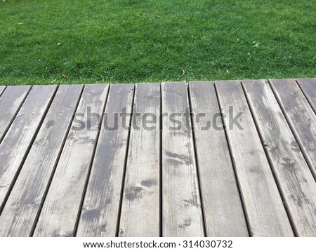 Outdoor wood planks near grass