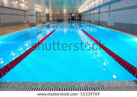the view of a swimming pool indoors