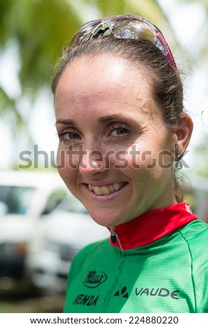 LANGKAWI, MALAYSIA - 18 OCTOBER 2014: Winner of women elite category Eva Lechner  of Colnago Sudtirol Team in at Tradewinds LIMBC 2014 on October 18, 2014.