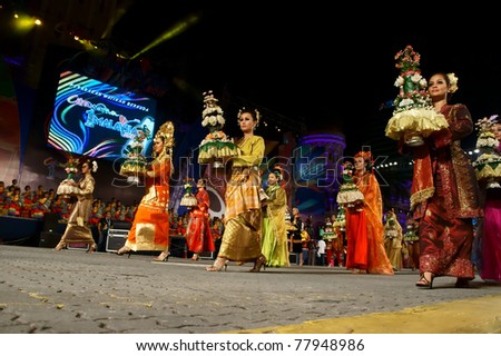 KUALA LUMPUR,MALAYSIA-MAY 20:Participant wearing traditional costume at the rehearsal of Colours of Malaysia May 20 2011 in Kuala Lumpur Malaysia. 24.6million tourist visited Malaysia in 2010
