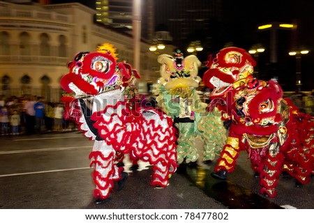 KUALA LUMPUR, MALAYSIA-MAY 21:Malaysian Chinese performing a lion dance at the of Colours of 1 Malaysia May 21 2011 in Kuala Lumpur Malaysia. 24.6million tourist visited Malaysia in 2010.