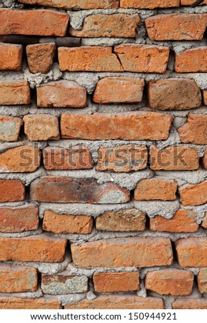 Orange bricks and mortar wall texture