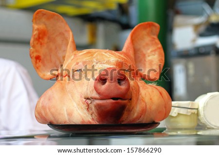 Big pig head in bucher shop