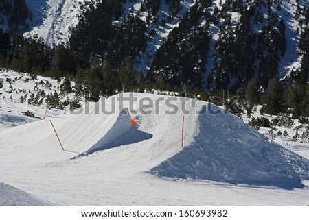 Snowboarding ramp for big jumps at mountain