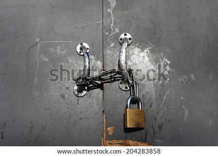 Chain and lock at shed door