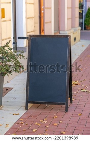 Similar – Foto Bild freistehendes Straßenschild „Am Waldrand“ vor einem Haus und Bäumen bei trübem Wetter, aus der Froschperspektive