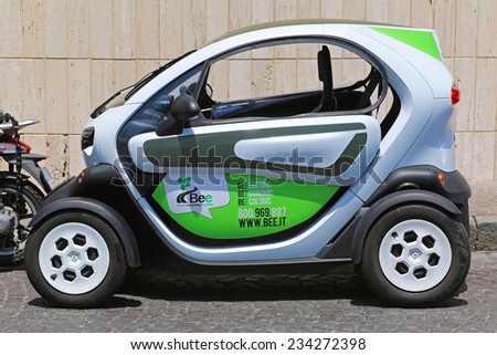 NAPLES, ITALY - JUNE 23: Bee electric car in Naples on JUNE 23, 2014. Renault Twizy for green mobility sharing parked in Naples, Italy.