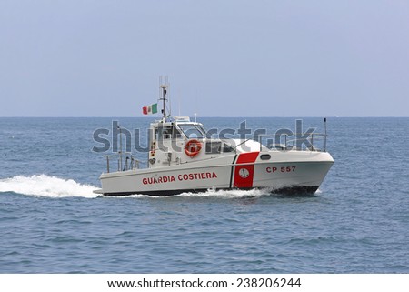 AMALFI COAST, ITALY - JUNE 28: Guardia Costiera in Amalfi Coast on JUNE 28, 2014. Coast Guard boat patroling at Tyrrhenian sea in Amalfi Coast, Italy.