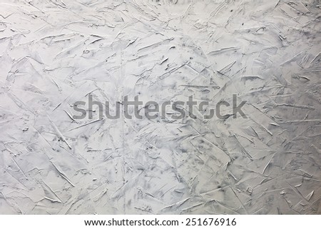 White wall with paint strokes texture background