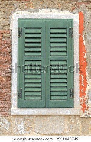 Similar – Image, Stock Photo Window with closed, green shutters in a red wall with plants in front of it